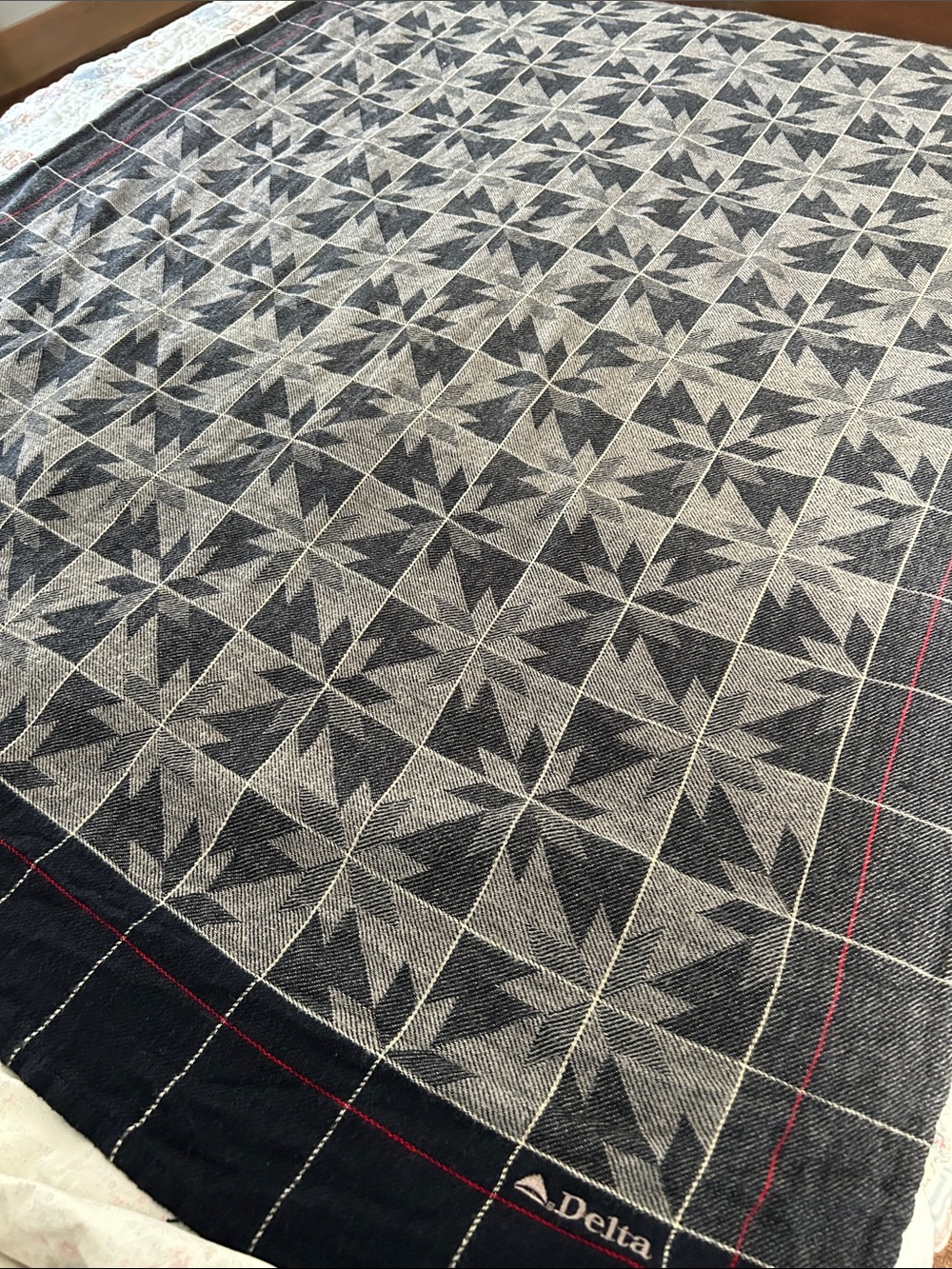 Delta Black and Cream Geometric Star Pattern Throw
